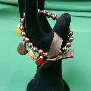 Brown faux pearl stretch bracelet.